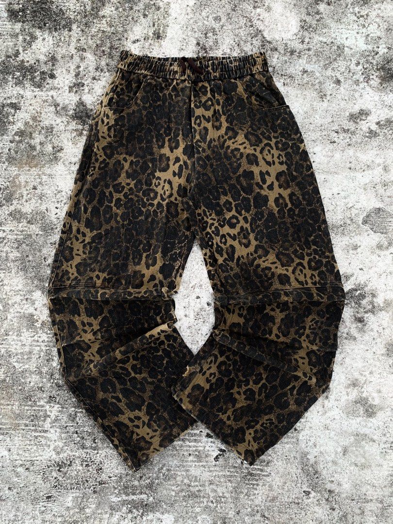 Leopard Print Elastic Waist Pants (Category: Jeans) located in Manila. Submitted by fiercefox.4ae806 (Listing ID 1464482911, Image 1). Description: - Trendy leopard print pants - Comfortable elastic waistband with drawstring - Convenient front pockets - Relaxed fit for everyday wear - A stylish statement piece for your wardrobe.