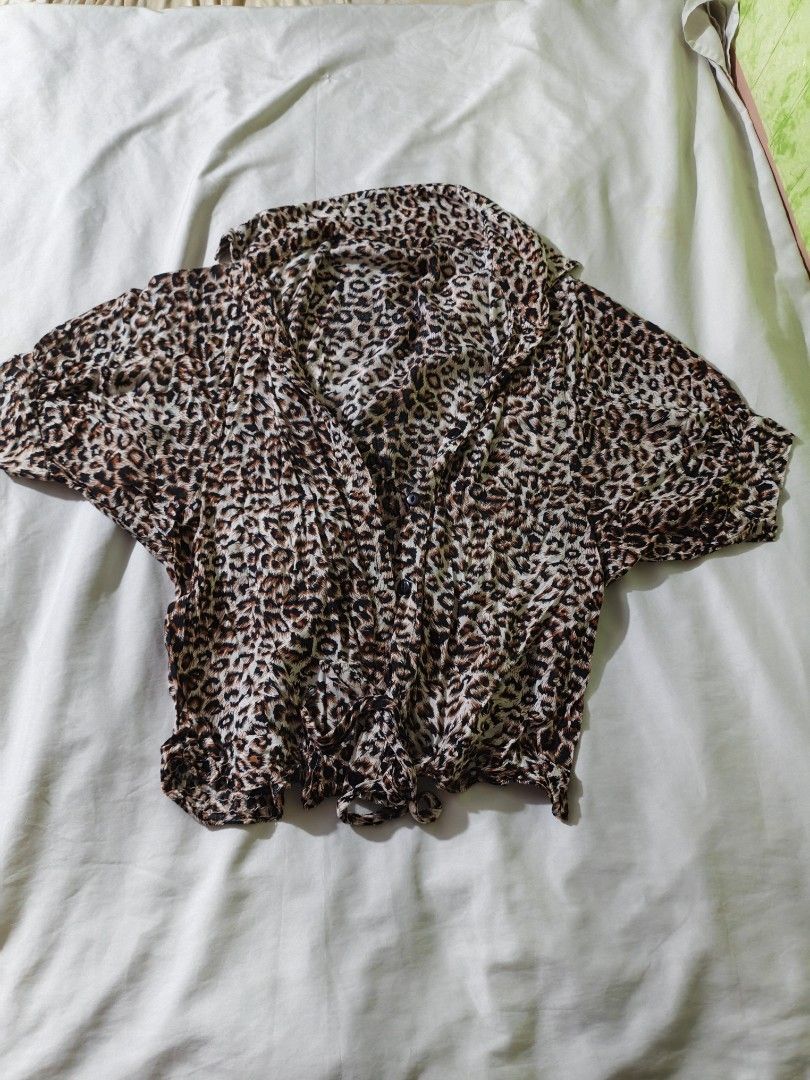 Leopard Print Sheer Kimono Top (Category: Blouses) located in Manila. Submitted by ms_pamaqued (Listing ID 1464355182, Image 1). Description: Cute leopard print kimono top. Lightweight and sheer material. Short sleeves with a relaxed fit. Great for layering over a tank or bralette. Adds a fun vibe to any outfit. Easy to wear and style..
