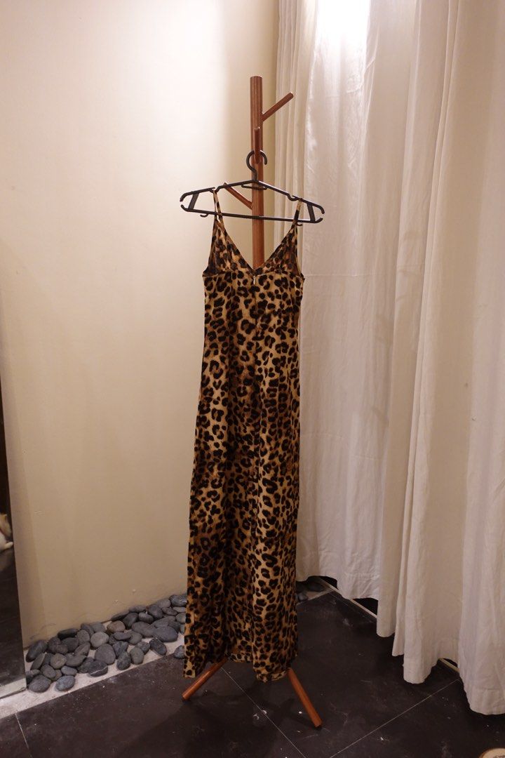 Leopard Print Slip Maxi Dress (Category: Dresses) located in Pasig City. Submitted by hulyascloset (Listing ID 1464544811, Image 3). Description: - Chic leopard print slip dress - Maxi length - Delicate spaghetti straps - Flattering V-neckline - Convenient back zipper closure - Versatile for night outs or casual days - Easily styled with heels or sneakers.