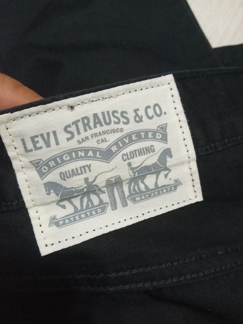 Levi Strauss & Co. Black Jeans chino (Category: Jeans) located in Tanay. Submitted by jrgoods (Listing ID 1464473607, Image 3). Description: Levi's black chino pants Size 32 Length 43.5 Hem 7 Good as new condition Semi stretch fabric 1199+ship Tanay Rizal location Shipping Nationwide - Straight leg fit - Button fly closure - Two back pockets with signature stitching - Small red tab on back pocket - Comfortable for everyday wear - Perfect wardrobe