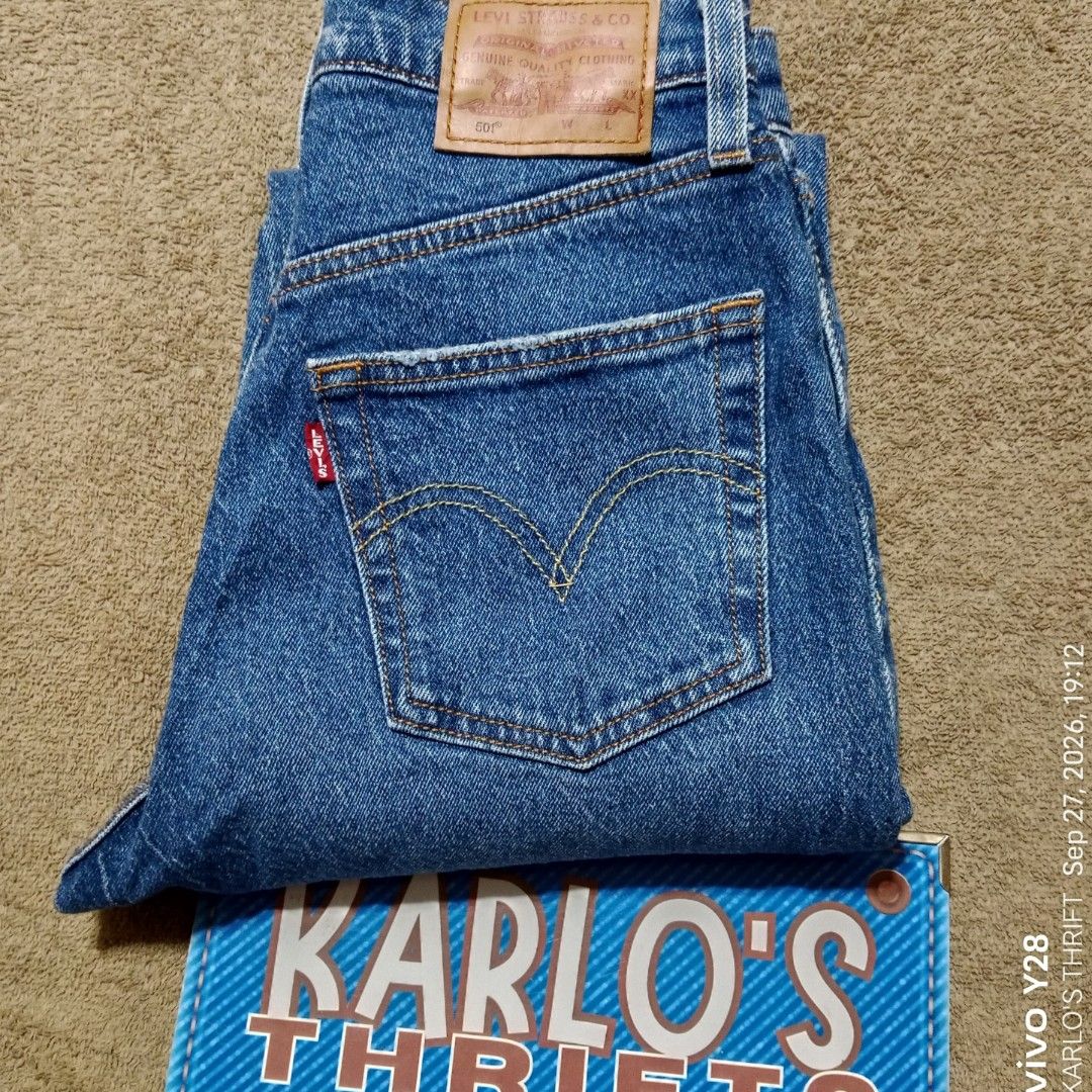 LEVI'S 501 CROP JEANS (Category: Jeans) located in Davao. Submitted by karlosthriftshop (Listing ID 1464471141, Image 1). Description: ₱780 FREE SHIPPING THRU J &T The Levi's Women's Premium 501 Original Crop jeans with a raw hem feature a high-rise waist, signature button fly, and a straight-leg cut finished with an unstitched, frayed ankle. MADE IN CAMBODIA W26 L30 ON TAG PLS.CHECK ATTACHED PHOTOS OF ACTUAL MEASUREMENT STRETCH LOW Key Features 