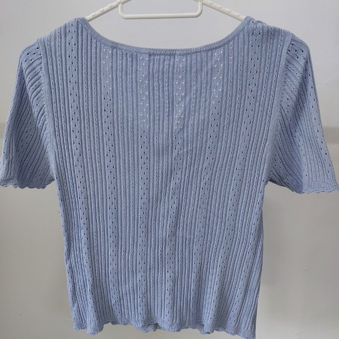 Light Blue Knit Top (Category: Blouses) located in Manila. Submitted by josta004 (Listing ID 1464407004, Image 2). Description: - light blue knit top -button-up front -very nice in actual RFS : decluttering.