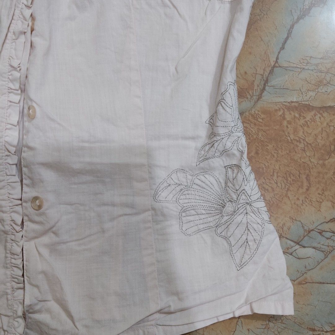 Light Blush Pink Embroidered Blouse (Category: Blouses) located in Valenzuela. Submitted by 0003c4 (Listing ID 1464453625, Image 3). Description: pale pink collared blouse, floral embroidery details short sleeves, button-down, fits small has super minimal holes at the back because I used a pin for it when I wore it :(( but it's barely visible especially when u iron it. 📍 Valenzuela 🚚 Lalamove / J&T available.