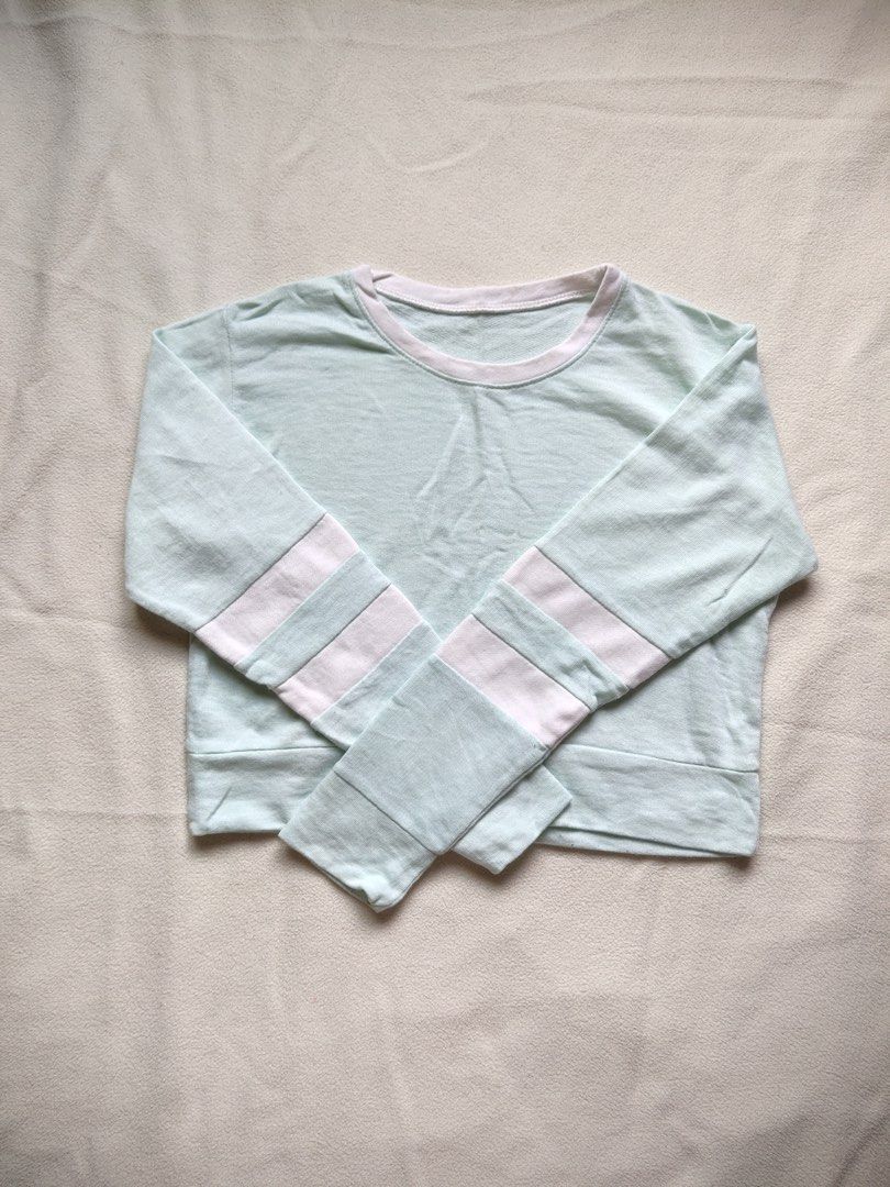 Light Green Cropped Sweatshirt with Pink Stripes (Category: Coats, Jackets and Outerwear) located in Caloocan City. Submitted by angelinee123 (Listing ID 1464421166, Image 2). Description: Freesize: S to semi L •Payment methods: Gcash (item price + sf) • Payment first policy • Delivery option: - J&t delivery : 2-3 days depends on loc - Lalamove: same day delivery - meetup: 5th avenue lrt station only (cod avail).