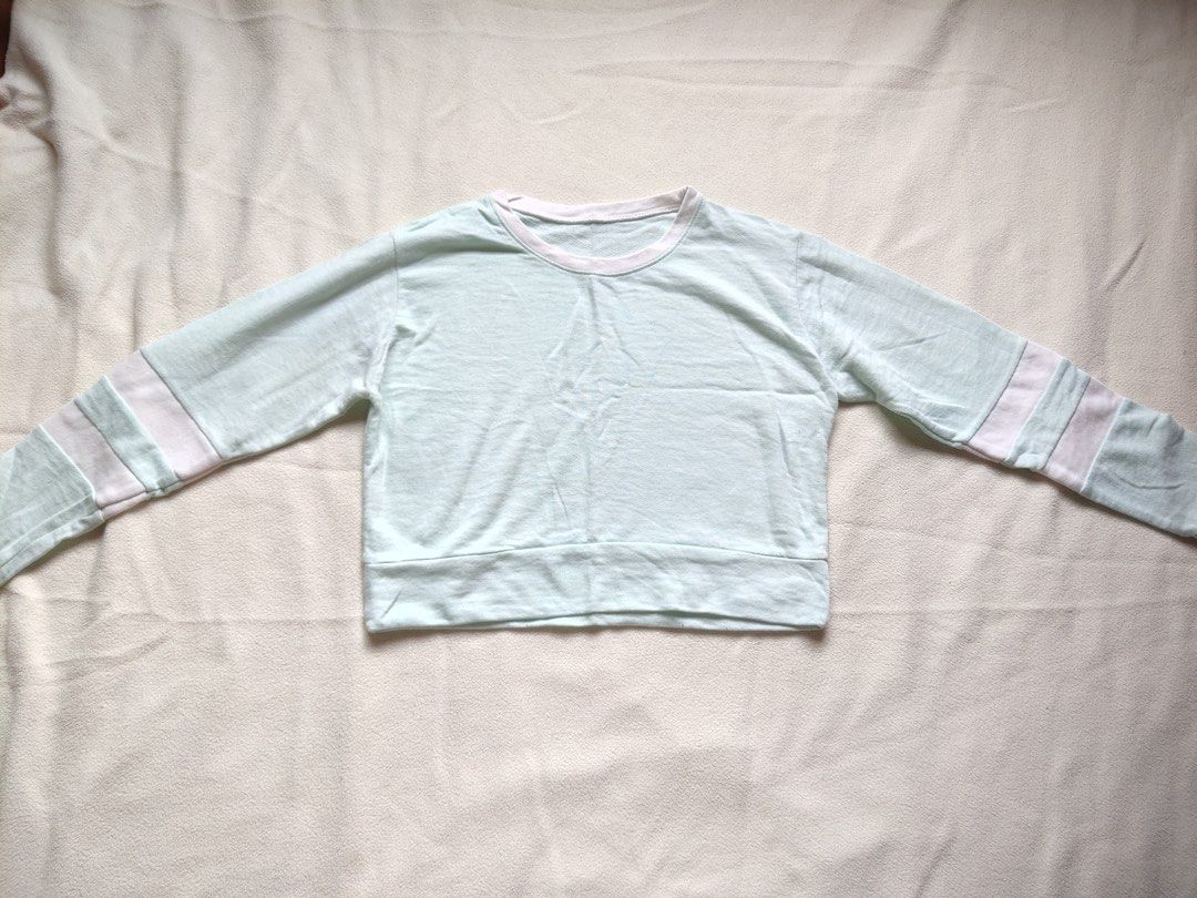 Light Green Cropped Sweatshirt with Pink Stripes (Category: Coats, Jackets and Outerwear) located in Caloocan City. Submitted by angelinee123 (Listing ID 1464421166, Image 3). Description: Freesize: S to semi L •Payment methods: Gcash (item price + sf) • Payment first policy • Delivery option: - J&t delivery : 2-3 days depends on loc - Lalamove: same day delivery - meetup: 5th avenue lrt station only (cod avail).