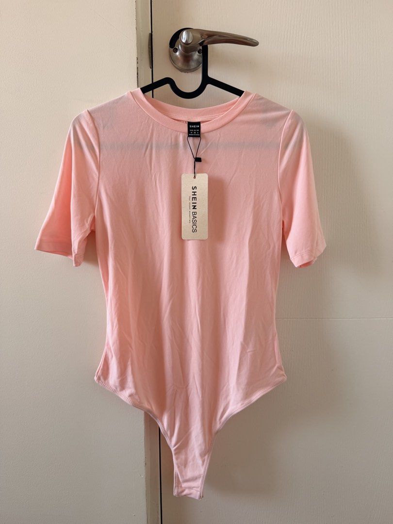 Light pink bodysuit BEAND NEW (Shein basics) (Category: Shirts) located in Manila. Submitted by pvreal (Listing ID 1464441408, Image 1). Description: Never worn light pink bodysuit from Shein RFS: doesn’t fit me properly!.