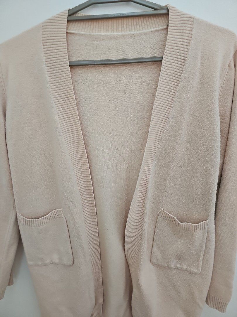 Light Pink Knit Cardigan with Pockets (Category: Coats, Jackets and Outerwear) located in Muntinlupa City. Submitted by shoptitak (Listing ID 1464414315, Image 3). Description: - Soft knit cardigan in cream - Two front pockets - Open front design - Ribbed cuffs and hem - Ideal for layering on cooler days - Versatile for styling with different outfits - Fits small to medium.