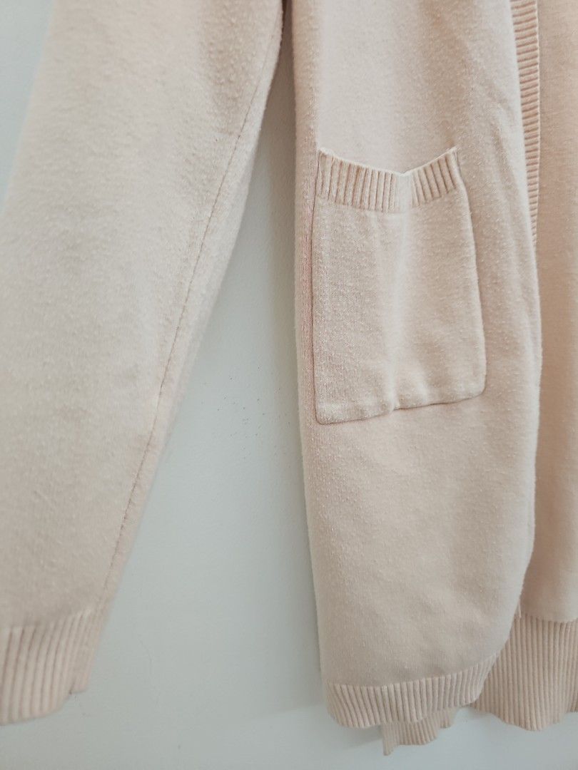 Light Pink Knit Cardigan with Pockets (Category: Coats, Jackets and Outerwear) located in Muntinlupa City. Submitted by shoptitak (Listing ID 1464414315, Image 2). Description: - Soft knit cardigan in cream - Two front pockets - Open front design - Ribbed cuffs and hem - Ideal for layering on cooler days - Versatile for styling with different outfits - Fits small to medium.