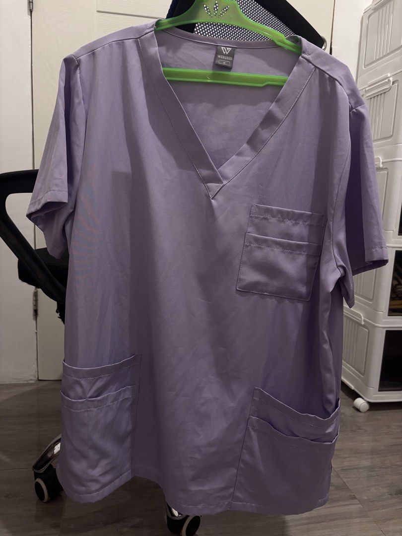 Light Purple Scrub Set with Cargo Pants (Category: Sets or Coordinates) located in Gapan. Submitted by nicwyy (Listing ID 1464492984, Image 1). Description: FOR SALE!!! ⭐️WeNurse Light Light Purple Scrub Suit Set Size: Medium-Large Used only once, still good as new! ☺️ Can do shipping via j&t or lbc, SF will be shouldered by buyer. 💗.