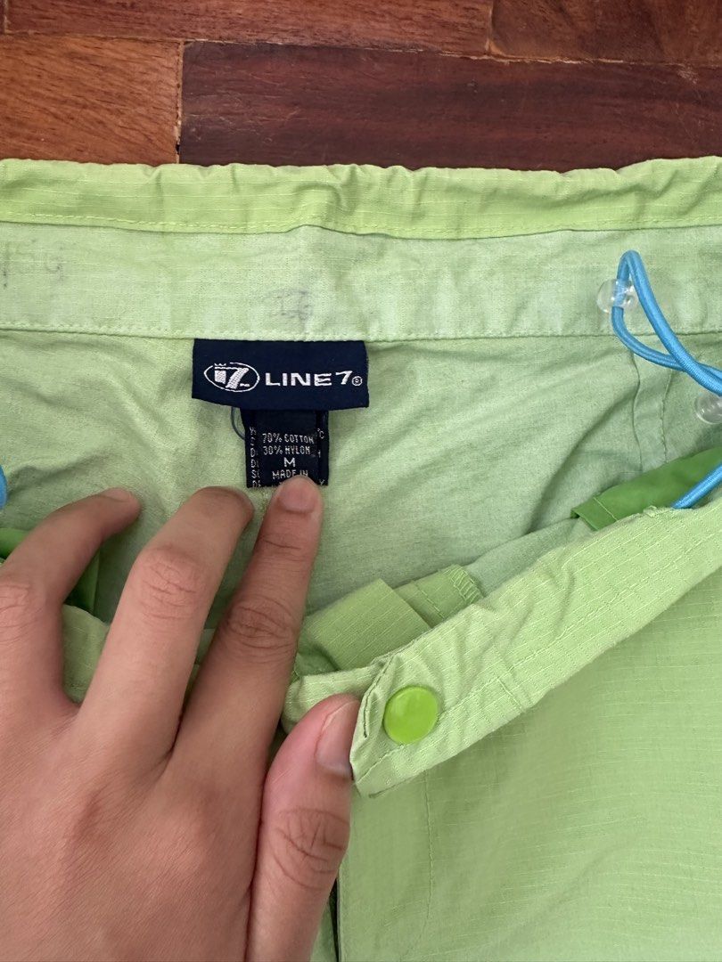 LINE 7 Light Green Cotton Nylon Pants (Category: Trousers) located in Cainta. Submitted by buy.preloved (Listing ID 1464375783, Image 2). Description: - Brand: LINE 7 - Color: Light Green - Material: Cotton and Nylon Blend - Features: Drawstring waist, Button closure - Length: Cropped - Style: Casual wear - Note: Please check measurements for accurate fit..