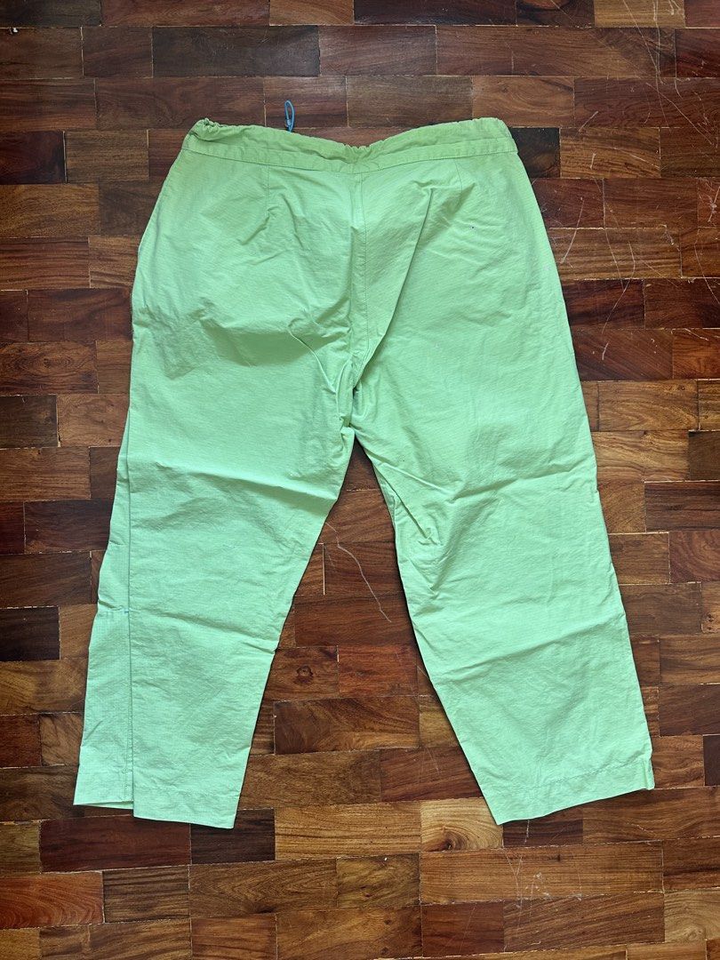 LINE 7 Light Green Cotton Nylon Pants (Category: Trousers) located in Cainta. Submitted by buy.preloved (Listing ID 1464375783, Image 3). Description: - Brand: LINE 7 - Color: Light Green - Material: Cotton and Nylon Blend - Features: Drawstring waist, Button closure - Length: Cropped - Style: Casual wear - Note: Please check measurements for accurate fit..