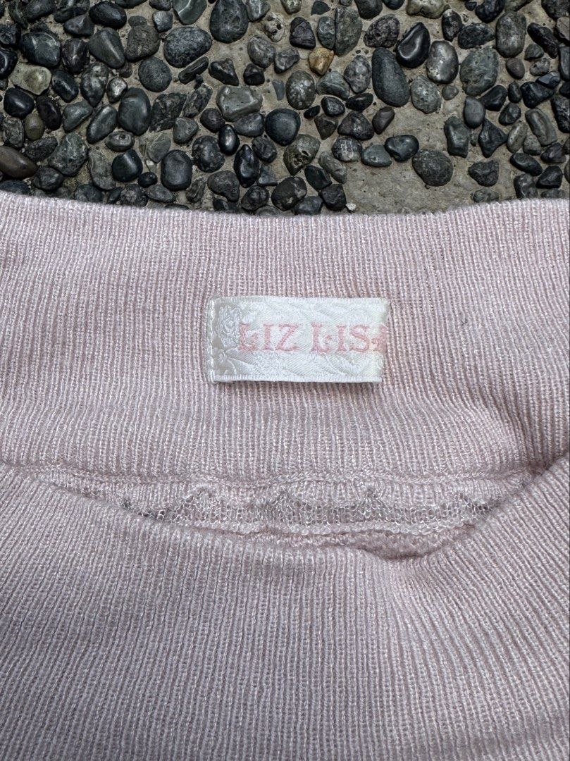 Liz Lisa Pink Ruffle Ribbon Top (Category: Sleeveless) located in Cavite. Submitted by ayaaaaa_ (Listing ID 1464452462, Image 2). Description: - no flaws - fits up to medium - last pic for ww reference only !! loc: General Trias, Cavite.