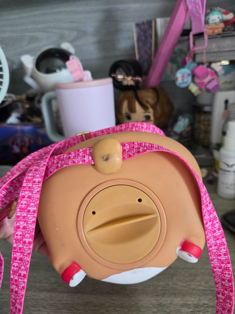 LOL Surprise Biggie Pets MC Hammy (Category: Kids Toys) located in Mangaldan. Submitted by jacqueline31426 (Listing ID 1464386970, Image 3). Description: - Adorable LOL Surprise Biggie Pets MC hammy - Features cute pink straps with a repeating pattern. - Includes a coin slot on the back for easy savings. - Ideal for kids to carry small essentials. - A must-have accessory for any LOL Surprise enthusiast..