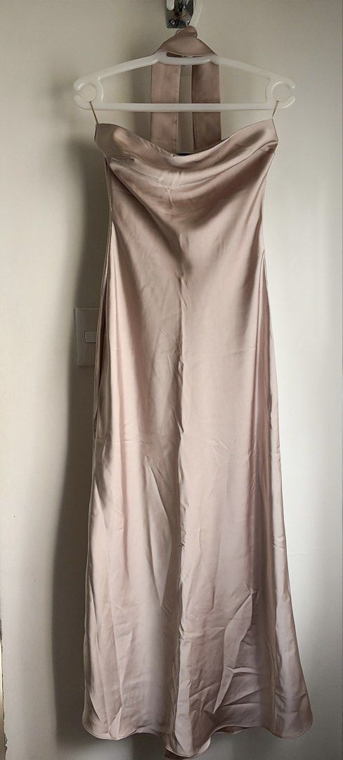 Long Form Bustier Silk Dress 🤎 (Category: Evening dresses & gowns) located in Manila. Submitted by ceethingsout (Listing ID 1464367206, Image 2). Description: - Elegant satin dress - has a halter neck tie / cowl neck scarf - Ideal for special events or a night out - Only worn once for a few hours - Vietnam made, bought for ₱1,400 Please note: There is a small fabric run/pull near the top, caused by the boutonniere that was pinned onto the garmen