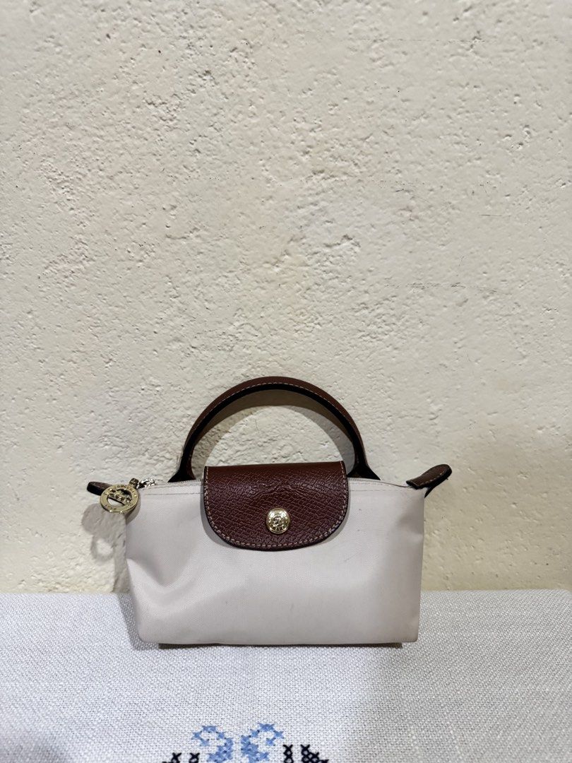 Longchamp Mini Le Pliege Natural Color (Category: Cross-body Bags) located in Manila. Submitted by namiskyumi (Listing ID 1464421039, Image 3). Description: .