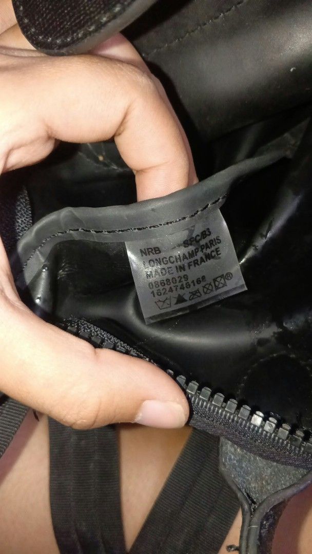 Longchamp Paris Nylon Top Handle Bag (Category: Luxury Bags & Wallets) located in Manila. Submitted by gbryanrave27905 (Listing ID 1464356844, Image 2). Description: 📌 Authentic Longchamp Paris black nylon top handle bag 📌 Made in France 📌 Features a detachable shoulder strap for versatile carrying 📌 Includes an interior zippered pocket for secure storage 📌Ideal everyday bag, perfectly sized for your essentials 📌issue none 📌colorrate 10/10