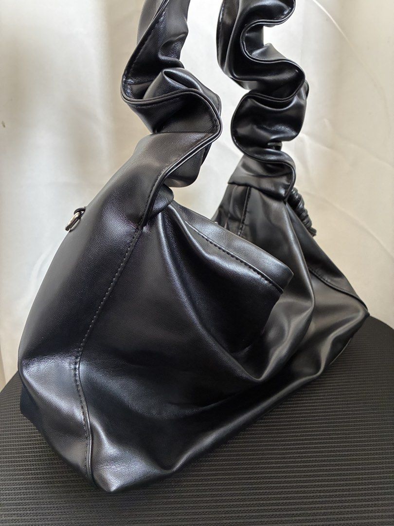 LONNE BY RON Adjustable Strap Shoulder-Crossbody Bag (Category: Shoulder Bags) located in Baguio. Submitted by vivmrtn (Listing ID 1464373350, Image 2). Description: [LONNE BY RON] ZEC BAG Color : Black / Ivory Size : 32cm x 20cm x 12cm (260g) Strap Size (ADJUSTABLE PLEASE SEE PICS) -Shoulder -Cross : 93cm Material: Artificial Leather Bought in SK in July 2026; used but not abused.