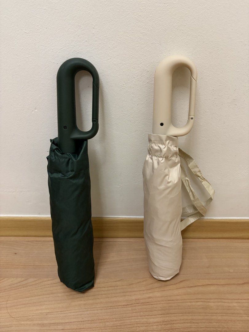 Loop Buckle Automatic Umbrella (Category: Umbrellas) located in Singapore. Submitted by o.rian (Listing ID 1464458413, Image 1). Description: Previously bought too many umbrellas, did not use at all - Super convenient automatic umbrella - Opens and closes with one click - Loop buckle handle for easy carrying - Compact size when folded, fits easily in bags - Available in dark green and beige ($10 Each) for both will be $17 - Great for unexpected r