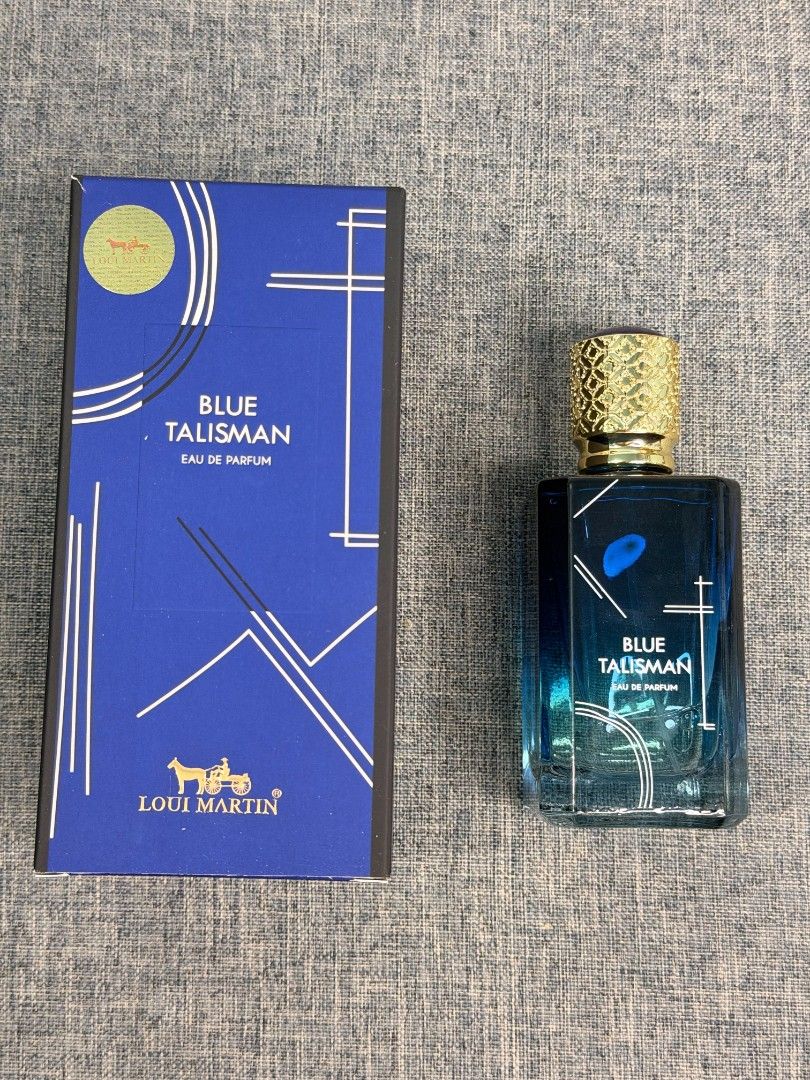 Louis Martin Blue Talisman Eau de Parfum (Category: Fragrance & Deodorants) located in Paranaque City. Submitted by barbs24 (Listing ID 1464454295, Image 1). Description: - Blue Talisman Eau de Parfum by Louis Martin - Comes in original packaging - Elegant blue bottle with a gold cap - Ideal fragrance for everyday wear.