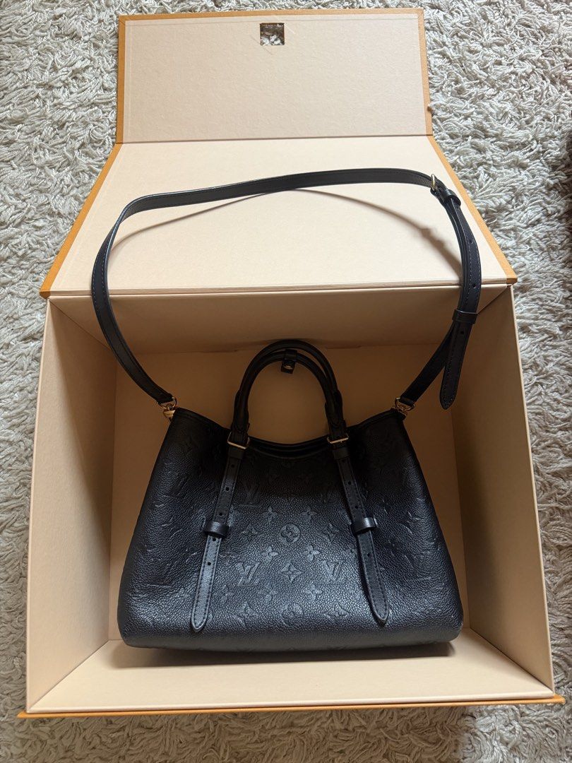 Louis Vuitton Black Leather Monogram Tote Bag (Category: Luxury Bags & Wallets) located in Quezon City. Submitted by boutiquedeauthentique (Listing ID 1464391481, Image 1). Description: - Authentic Black Louis Vuitton Tote Bag - Embossed Monogram Pattern on Leather - Top Handles - Detachable Shoulder Strap - Interior Zippered Pocket - Gold Hardware Details - Comes with Original Box.