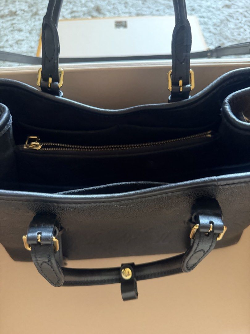 Louis Vuitton Black Leather Monogram Tote Bag (Category: Luxury Bags & Wallets) located in Quezon City. Submitted by boutiquedeauthentique (Listing ID 1464391481, Image 2). Description: - Authentic Black Louis Vuitton Tote Bag - Embossed Monogram Pattern on Leather - Top Handles - Detachable Shoulder Strap - Interior Zippered Pocket - Gold Hardware Details - Comes with Original Box.