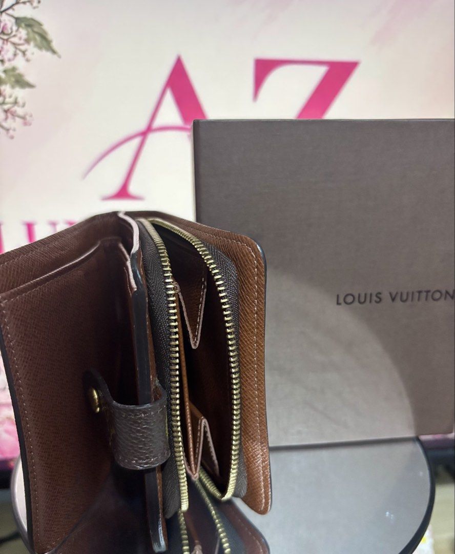 Louis Vuitton Monogram Canvas Zippy Compact Wallet (Category: Luxury Bags & Wallets) located in Mandaluyong City. Submitted by annaziki2001 (Listing ID 1464568436, Image 3). Description: - Authentic Louis Vuitton wallet - Classic Monogram canvas exterior - Rich brown leather interior - Multiple card slots for organization - Convenient zippered coin pocket - Includes original box and dust bag - Ideal for keeping your essentials tidy.
