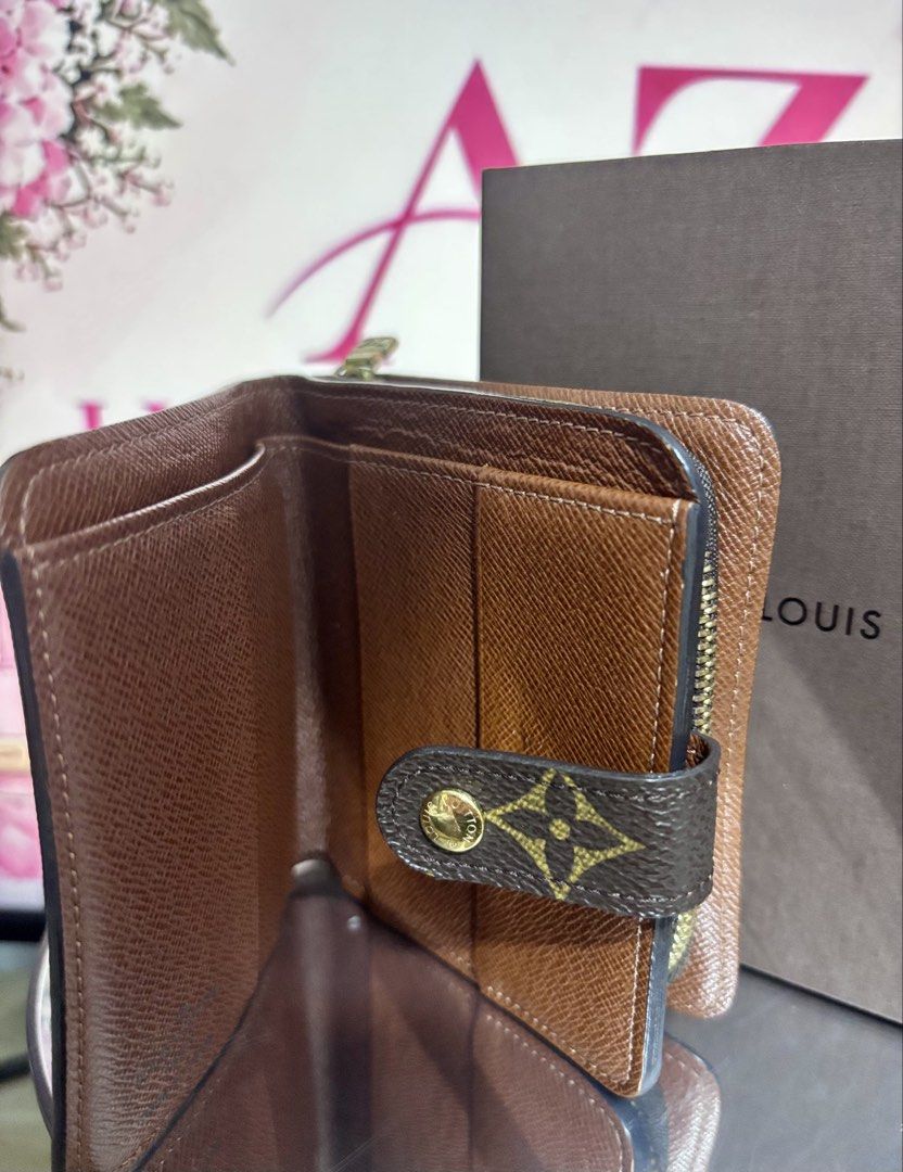 Louis Vuitton Monogram Canvas Zippy Compact Wallet (Category: Luxury Bags & Wallets) located in Mandaluyong City. Submitted by annaziki2001 (Listing ID 1464568436, Image 2). Description: - Authentic Louis Vuitton wallet - Classic Monogram canvas exterior - Rich brown leather interior - Multiple card slots for organization - Convenient zippered coin pocket - Includes original box and dust bag - Ideal for keeping your essentials tidy.