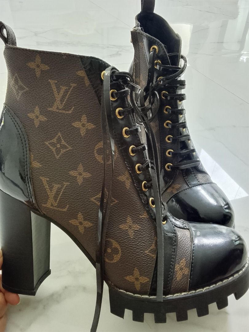 Louis Vuitton monogram combat boots (Category: Boots) located in Quezon City. Submitted by kema2191 (Listing ID 1464393215, Image 2). Description: Iconic Louis Vuitton monogram print - Black patent leather accents - Lace-up front with convenient side zipper - Trendy chunky platform heel - Expertly crafted in Italy - Please check photos for detailed condition.