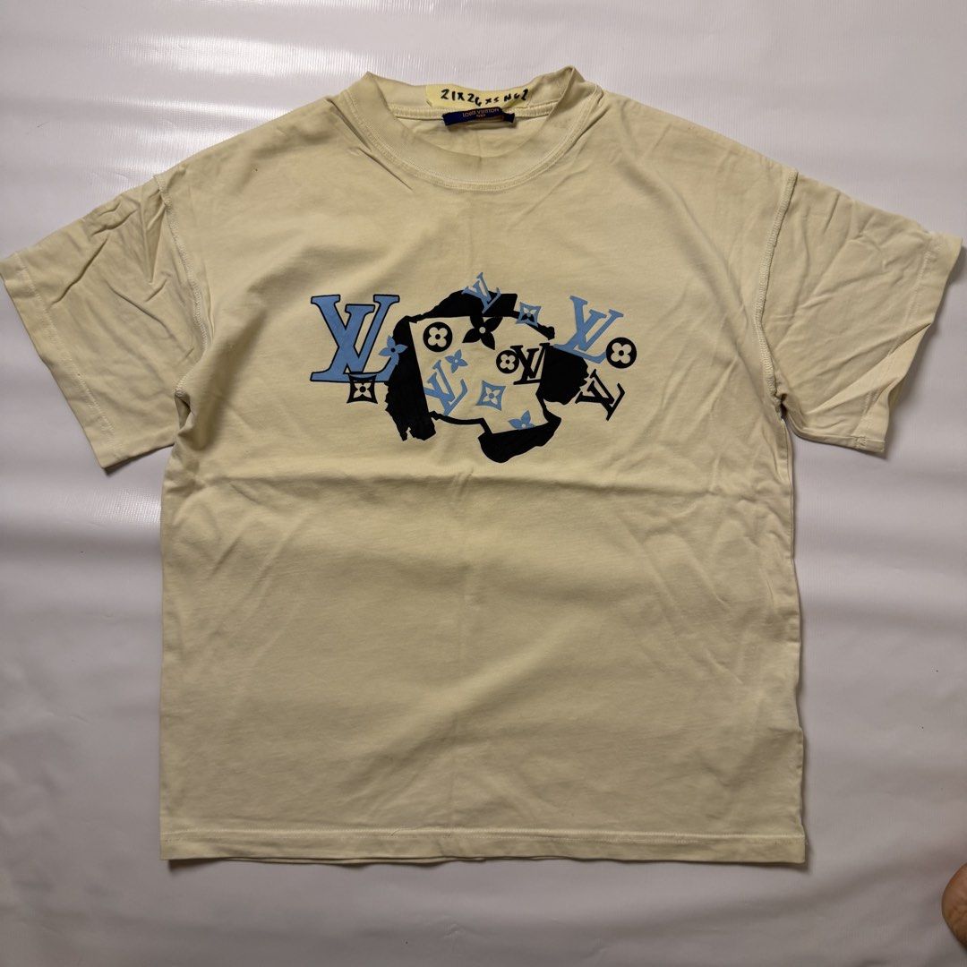 Louis Vuitton Monogram Graphic T-Shirt (Category: Luxury Apparel) located in Manila. Submitted by johnedel_james (Listing ID 1464538554, Image 1). Description: - Authentic Louis Vuitton t-shirt - Cream color with iconic LV monogram print - Features a stylish graphic overlay - Made in Italy - Size XS - Ideal for everyday casual wear.