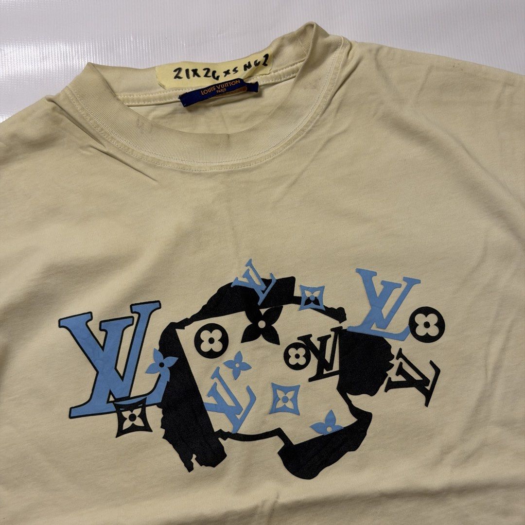 Louis Vuitton Monogram Graphic T-Shirt (Category: Luxury Apparel) located in Manila. Submitted by johnedel_james (Listing ID 1464538554, Image 2). Description: - Authentic Louis Vuitton t-shirt - Cream color with iconic LV monogram print - Features a stylish graphic overlay - Made in Italy - Size XS - Ideal for everyday casual wear.