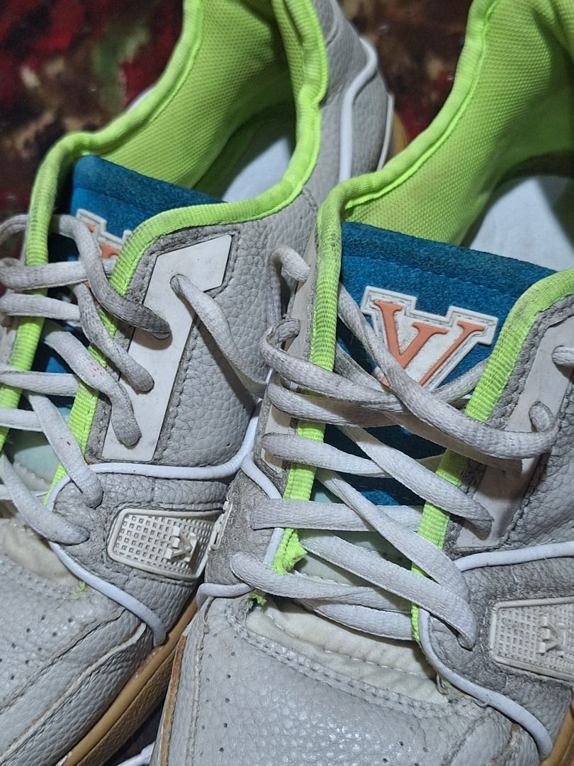 Louis Vuitton Sneakers (Category: Sneakers & Footwear) located in Caloocan City. Submitted by tallagel27 (Listing ID 1464407582, Image 2). Description: - Authentic Louis Vuitton sneakers - White and grey leather with striking neon green accents - Features classic LV monogram details - Ideal for adding a stylish touch to your casual outfits.
