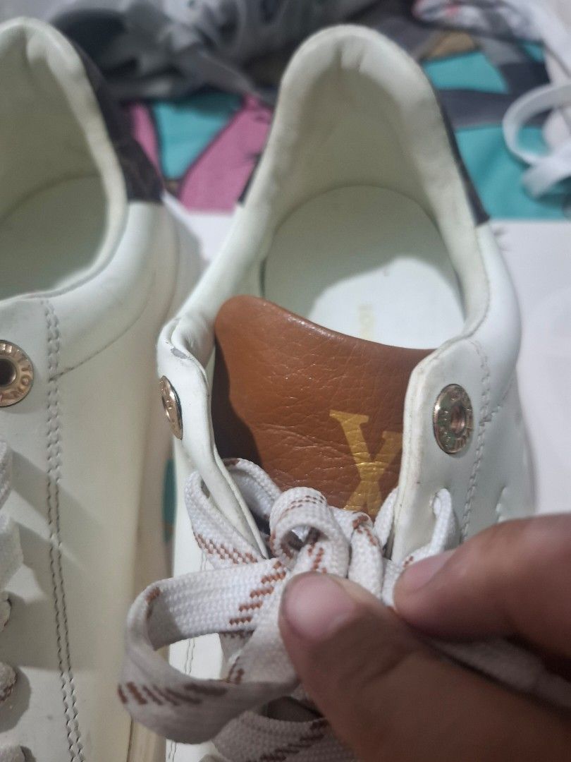 Louis Vuitton White Leather Sneakers Size 36 (Category: Sneakers) located in Marikina City. Submitted by bags21.ph (Listing ID 1464488702, Image 2). Description: - Authentic Louis Vuitton white leather sneakers - Size 36 - Iconic monogram print on heel tab - Comes with unique patterned laces - Ideal for stylish everyday wear.