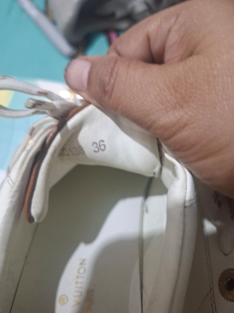 Louis Vuitton White Leather Sneakers Size 36 (Category: Sneakers) located in Marikina City. Submitted by bags21.ph (Listing ID 1464488702, Image 3). Description: - Authentic Louis Vuitton white leather sneakers - Size 36 - Iconic monogram print on heel tab - Comes with unique patterned laces - Ideal for stylish everyday wear.