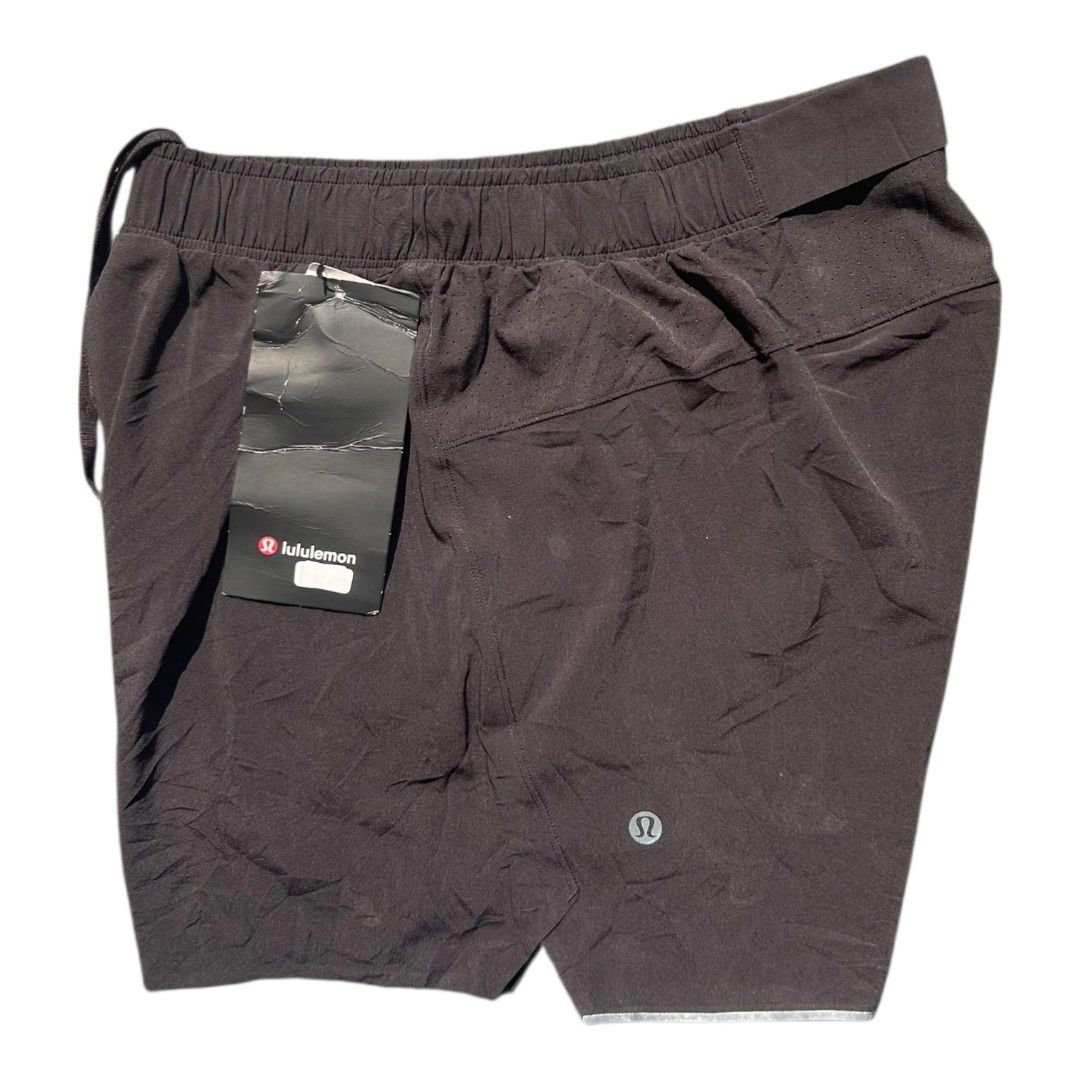 Lululemon Black Athletic Shorts Size S (Category: Activewear) located in Dumaguete. Submitted by mastermasto (Listing ID 1464383069, Image 2). Description: - Lululemon Surge Lined Running Short 4" - Size: Small (S) - Features: Elastic waistband with drawstring - Material: Lightweight, ideal for running and workouts - Details: Lululemon logo on the back - Condition: Brand new with tags attached needs wash.