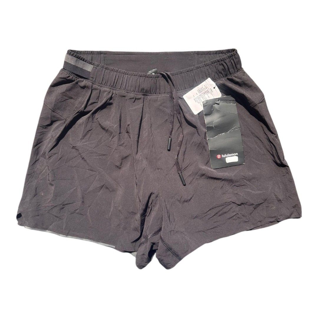 Lululemon Black Athletic Shorts Size S (Category: Activewear) located in Dumaguete. Submitted by mastermasto (Listing ID 1464383069, Image 1). Description: - Lululemon Surge Lined Running Short 4" - Size: Small (S) - Features: Elastic waistband with drawstring - Material: Lightweight, ideal for running and workouts - Details: Lululemon logo on the back - Condition: Brand new with tags attached needs wash.