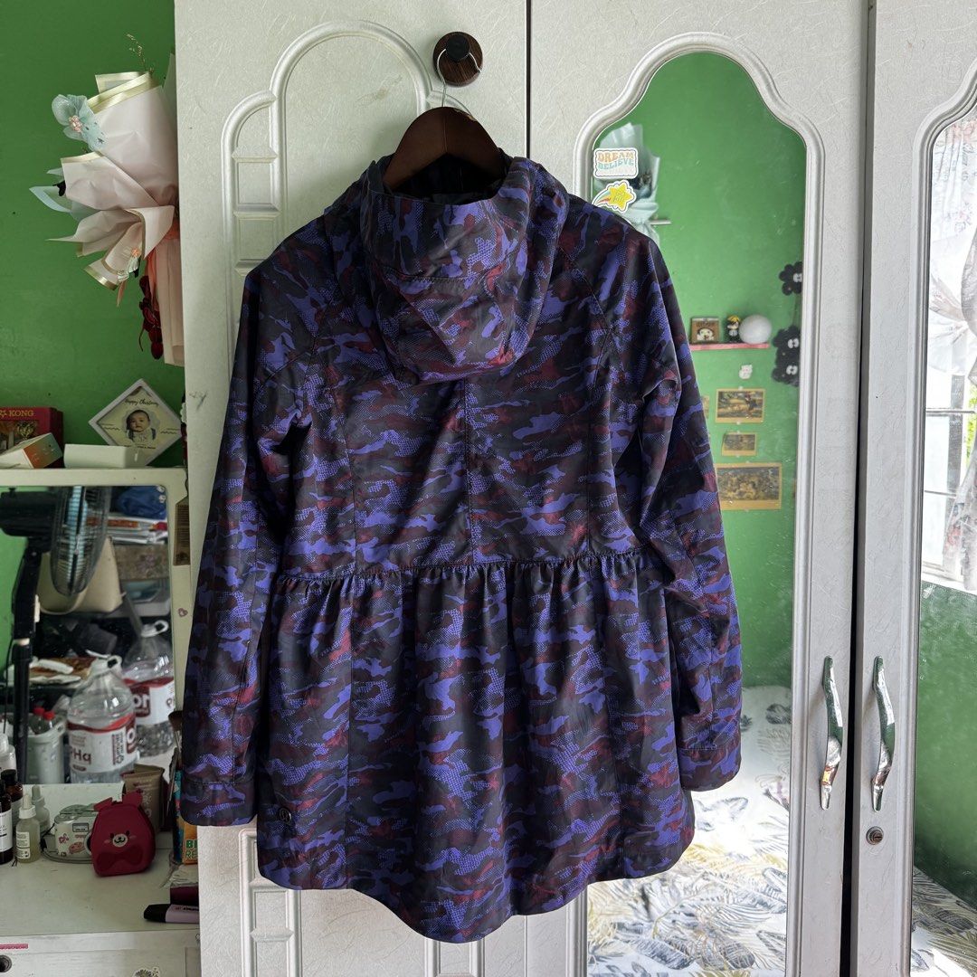 Lululemon Camo Rain For Daze Hooded Jacket (Category: Coats, Jackets and Outerwear) located in Manila. Submitted by zennyaur (Listing ID 1464395878, Image 3). Description: - Lululemon hooded jacket - Stylish purple and black camouflage print - Full zip-up front - Convenient pockets - Elasticated waist detail for a comfortable fit - Lightweight material, ideal for workouts or casual wear.