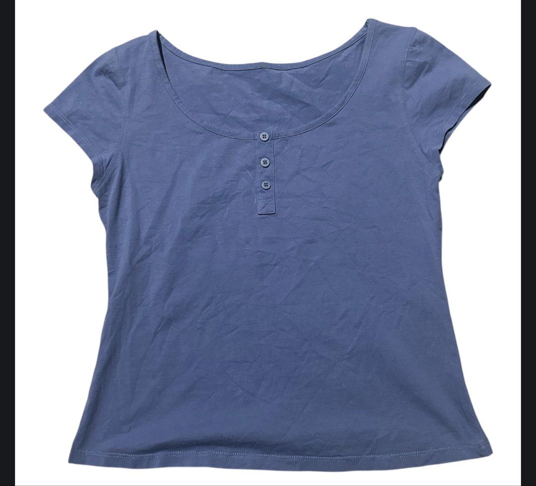 Lululemon cap sleeve henley t-shirt size medium (Category: Activewear) located in Iba. Submitted by xooperfindslb (Listing ID 1464469650, Image 2). Description: Lululemon cap sleeve henley t-shirt size medium Armpit to armpit 16 inches when laid flat Color: blue Good condition No issue.