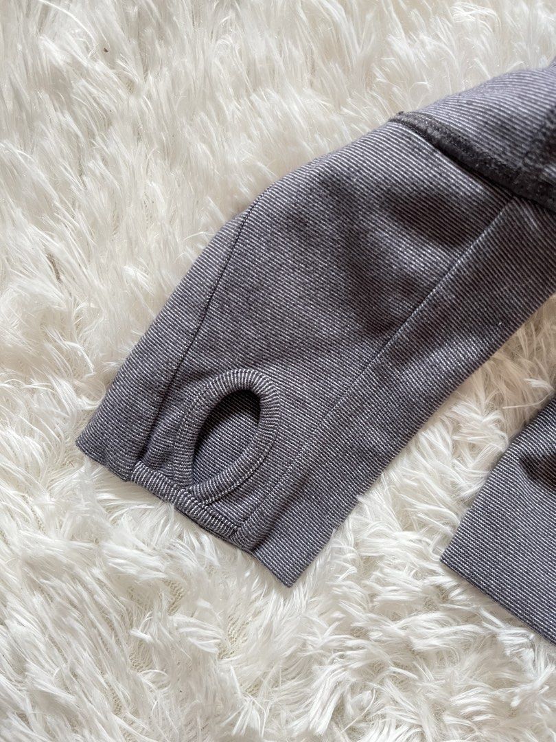 Lululemon Grey Zip-Up Jacket with Thumbholes (Category: Coats, Jackets and Outerwear) located in Valenzuela. Submitted by lovepatt (Listing ID 1464424629, Image 3). Description: - Grey Lululemon jacket - Full zip closure with high collar - Two zippered front pockets - Thumbholes on sleeves - Soft and stretchy material - Ideal for workouts or casual wear.