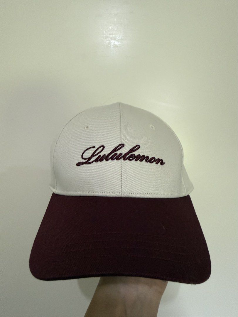 Lululemon Structured Classic Ball Cap Script (Category: Activewear) located in Manila. Submitted by katsinlao (Listing ID 1464414134, Image 1). Description: Details: • Color: White with maroon brim • Size: S/M - Brand new and original tag still attached - Purchased in Utah 🇺🇸 Payment: - Payment first policy - Gcash - Maya - GoTyme - COD (if lalamove) - Cash (if meet up).