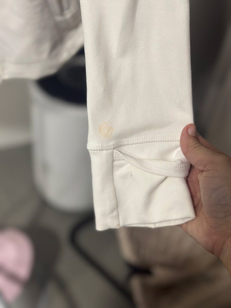Lululemon White Jacket size 2 (Category: Coats, Jackets and Outerwear) located in Cavite. Submitted by prelovedbymaeve (Listing ID 1464451988, Image 3). Description: - White Lululemon jacket - Full zip closure - Two zip pockets - Thumbholes on sleeves.