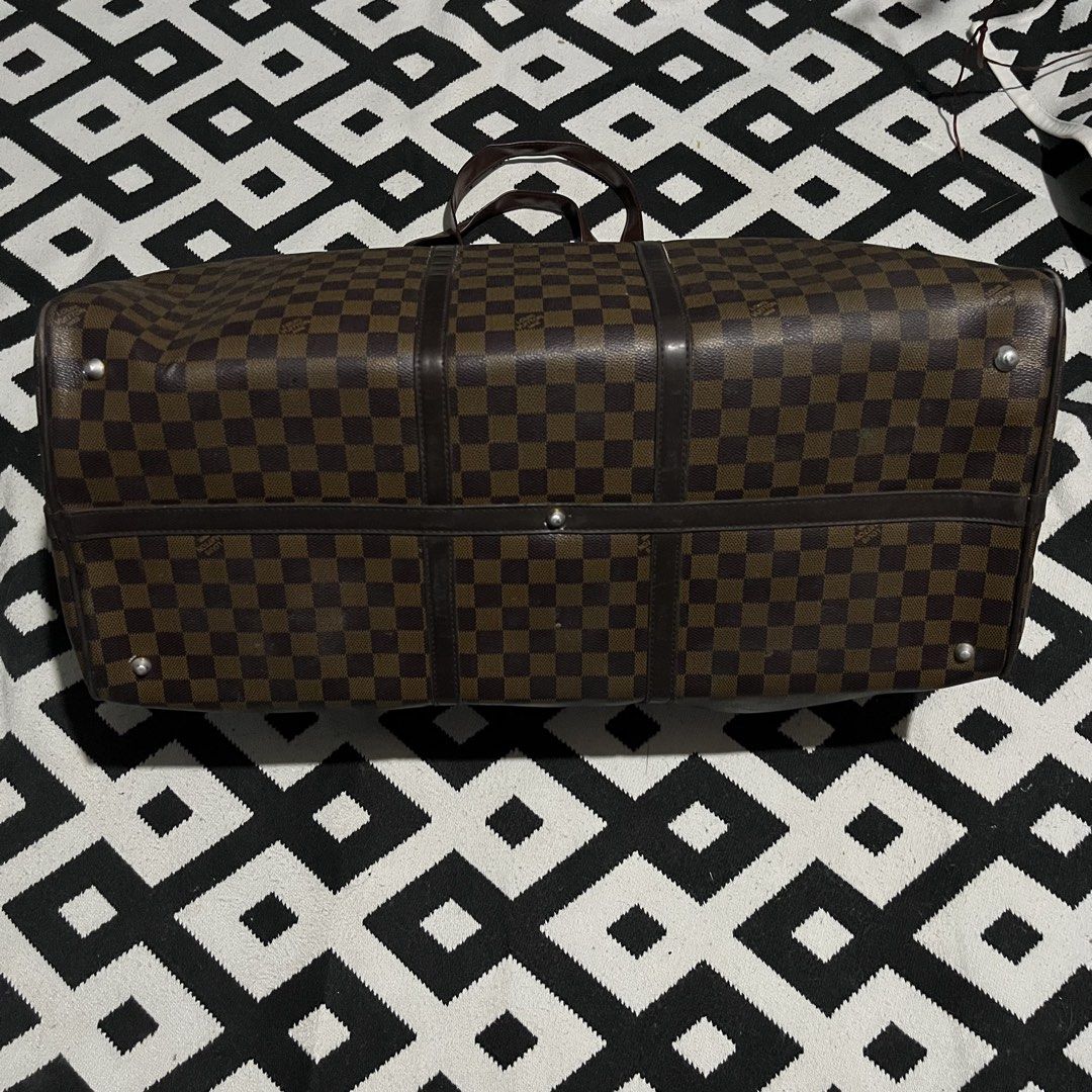 LV DUFFLE BAG (Big size) (Category: Luxury Bags & Wallets) located in Manila. Submitted by seven.stitch (Listing ID 1464410648, Image 2). Description: lv duffle bag no hard issue sa mismong bag replacement handle still good condition .