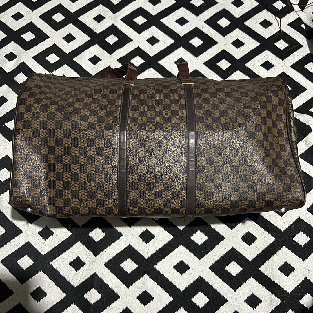 LV DUFFLE BAG (Big size) (Category: Luxury Bags & Wallets) located in Manila. Submitted by seven.stitch (Listing ID 1464410648, Image 1). Description: lv duffle bag no hard issue sa mismong bag replacement handle still good condition .
