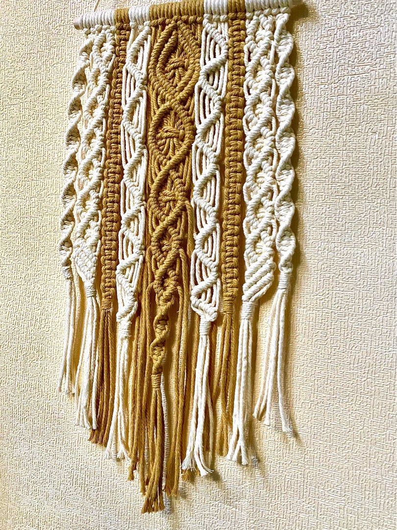 RUSH SALE Macrame Wall Hang (Category: Wall Decor) located in Caloocan City. Submitted by wearprelovedmnl (Listing ID 1464566345, Image 3). Description: Macrame Wall Hang W 7” H 11” Color: Toasted Almond, Cream Buyer handles SF.