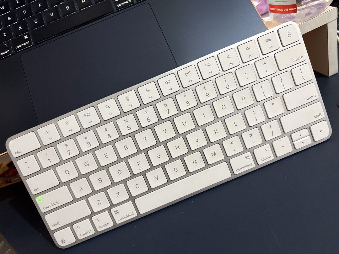 Magic Keyboard (Category: Computer Keyboard) located in Tanza. Submitted by angelicaagb (Listing ID 1464495525, Image 1). Description: • Good working condition • With original box • With charging cable • Clean and well-kept • RFS: Not using anymore .