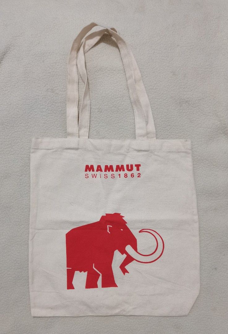 Mammut Organic Cotton Tote Bag (Category: Tote Bags) located in Santa Cruz. Submitted by oddpenguin-4575 (Listing ID 1464521311, Image 2). Description: 📌.....P L E A S E R E A D..... 📌measurement:L-14" /W-14" 📌color-9/10 📌Brand:mammut 📌issue:with storage but washable 📌Actual shades may differ slightly depending on ambient lighting conditions. 📌"Thrift Disclaimer: Items are pre-owned. Expect minor flaws like washable marks or storage dust. 