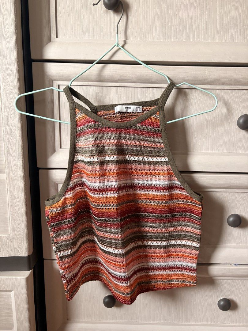 Mango Knit Coordinates (Category: Sets or Coordinates) located in Makati City. Submitted by iu__00 (Listing ID 1464388519, Image 2). Description: - Mango knit set - Size: Xs on tag (fit up to small) - Includes cropped tank top and wide-leg pants - Ideal for a casual, bohemian look - Lightweight and breathable material - Perfect for summer or layering.