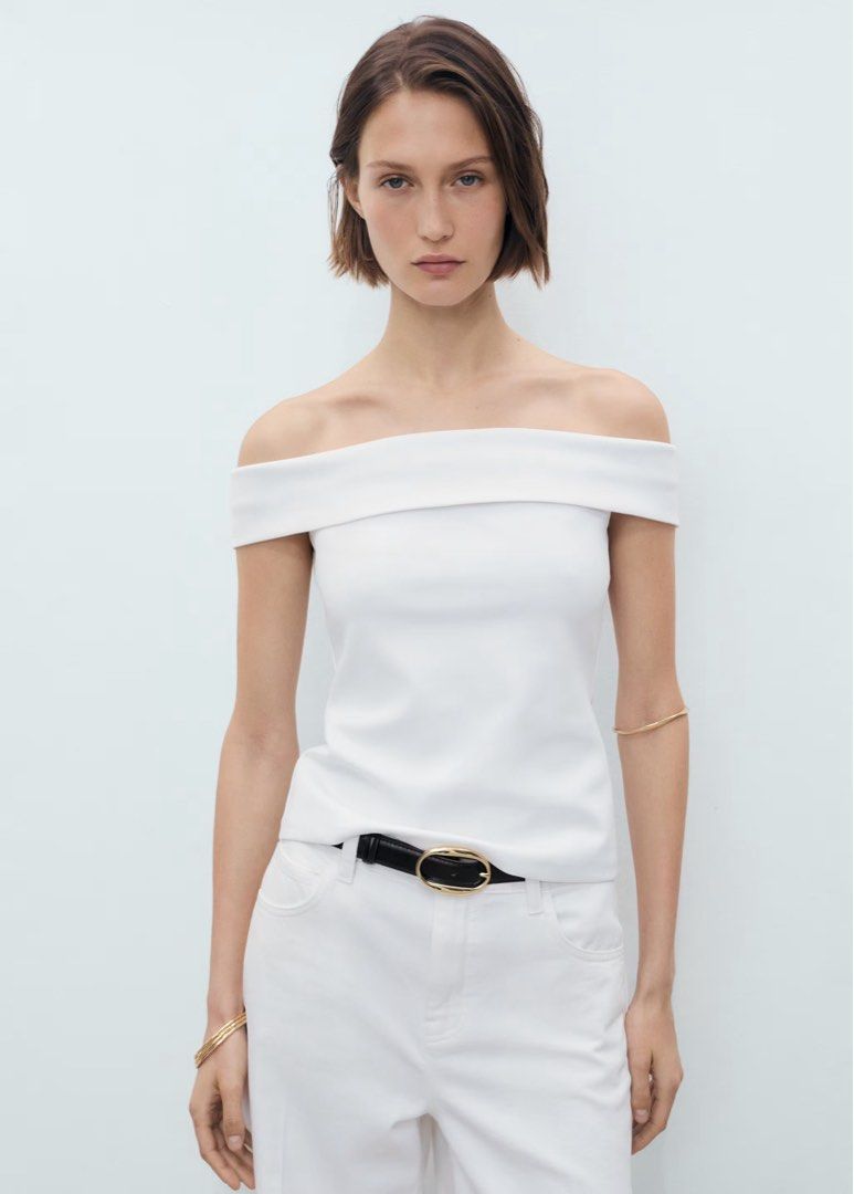 Mango Off Shoulder Top - International L - White (Category: Blouses) located in Pasig City. Submitted by oh_caroline (Listing ID 1464515100, Image 1). Description: - Mango white off-shoulder top - Size: International L - Simple and chic design - Perfect for dressing up or down - Pairs well with shorts or jeans - Comfortable fabric - TRIED only. still with tags. Last price only: 800.