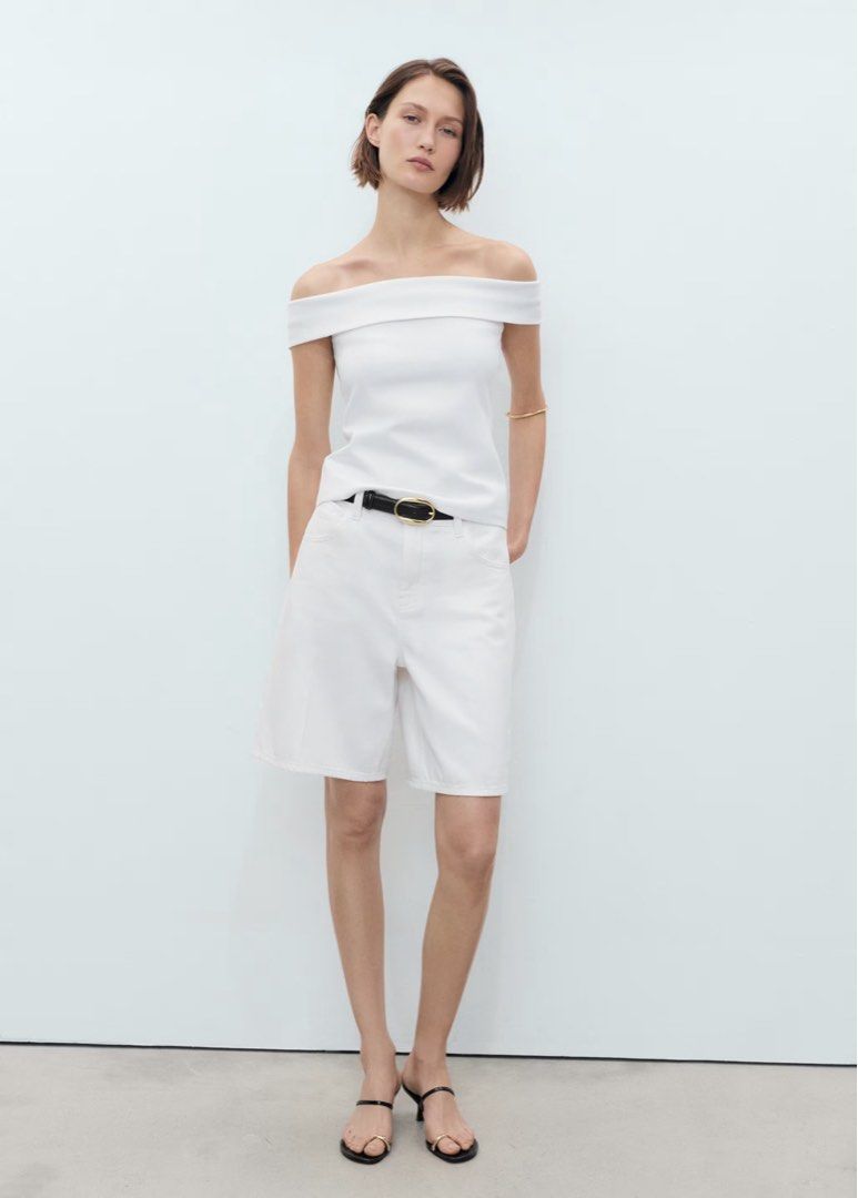 Mango Off Shoulder Top - International L - White (Category: Blouses) located in Pasig City. Submitted by oh_caroline (Listing ID 1464515100, Image 2). Description: - Mango white off-shoulder top - Size: International L - Simple and chic design - Perfect for dressing up or down - Pairs well with shorts or jeans - Comfortable fabric - TRIED only. still with tags. Last price only: 800.