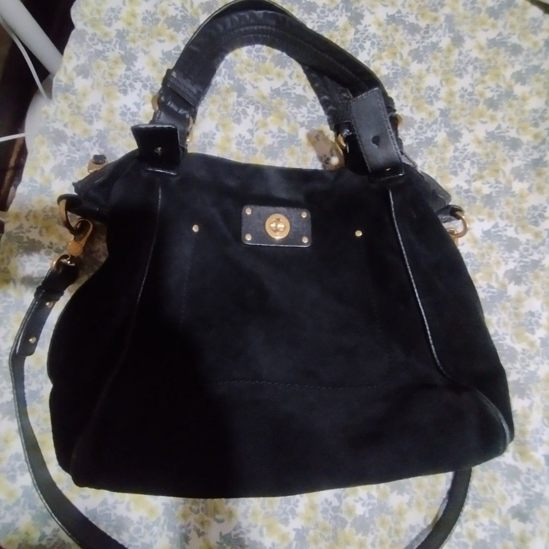 Marc by Marc Jacobs Black Suede Shoulder Bag (Category: Cross-body Bags) located in Manila. Submitted by lene48 (Listing ID 1464360839, Image 1). Description: - Brand: Marc by Marc Jacobs - Material: Black Suede - Hardware: Gold-tone - Features: Top handle, detachable shoulder strap - Interior: Signature logo print lining - Capacity: Spacious, perfect for essentials, orig made in indonesia.