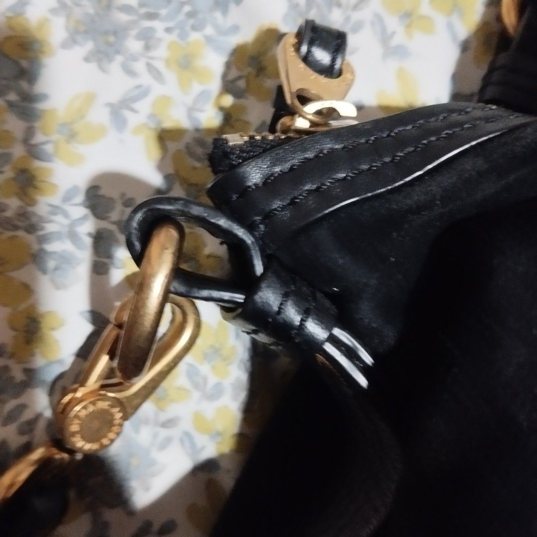 Marc by Marc Jacobs Black Suede Shoulder Bag (Category: Cross-body Bags) located in Manila. Submitted by lene48 (Listing ID 1464360839, Image 3). Description: - Brand: Marc by Marc Jacobs - Material: Black Suede - Hardware: Gold-tone - Features: Top handle, detachable shoulder strap - Interior: Signature logo print lining - Capacity: Spacious, perfect for essentials, orig made in indonesia.
